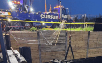 Driver rescued after SUV falls 16 feet into Barrie construction site pit